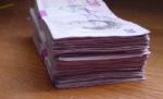 Criza financiară îi determină pe britanici să-şi depună banii în bănci islamice