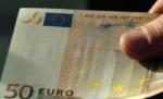 Românii au scos peste jumătate de miliard de euro din bănci numai în octombrie 