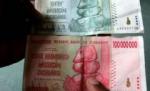Statul Zimbabwe a emis bancnota de 100 de miliarde de dolari locali 