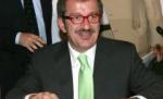Ministrul italian de interne, Roberto Maroni, a angajat români la negru

