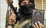 A primit un AK 47 pentru câştigarea unui concurs de recitare din Coran
