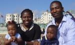 Doi britanici de origine nigeriană, părinţii unui bebeluş alb cu păr blond şi ochi albaştri 