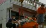 O femeie obeză din Taiwan, scoasă cu macaraua din casă (VIDEO)