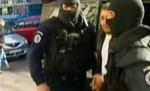 15 persoane acuzate de înşelăciuni imobiliare, reţinute de procurorii DIICOT (VIDEO)