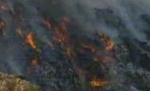 Groapa de gunoi a Braşovului arde de două zile (VIDEO)