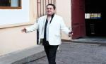 Adi Minune, acuzat că a furat o sticlă de şampanie de la benzinărie