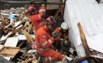  Doi supravieţuitori japonezi, găsiţi printre dărâmături la nouă zile de la cutremur 