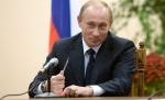 Vladimir Putin, sărutat cu pasiune de o admiratoare
