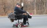 Un rus a străbătut 11.000 de kilometri într-un scaun cu rotile