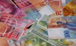Rate mai mari la creditele în franci elveţieni. Moneda Elveţiei a atins un nou maxim istoric