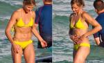 Cameron Diaz îşi etalează abdomenul plat şi ferm, pe o plajă din L.A.