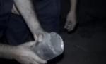 Un bărbat a murit după ce a încercat să taie un proiectil neexplodat cu flexul