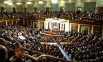 Doi senatori americani cer confiscarea unei părţi din fondurile lui Gaddafi