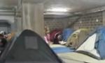 Un preot din Franţa găzduieşte în garajul bisericii opt familii de romi