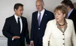 Sarkozy şi Merkel îl bagă în şedinţă pe Papandreou. Grecia jonglează cu viitorul nostru