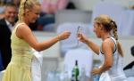 Caroline Wozniacki, dans sexy pe terenul de tenis