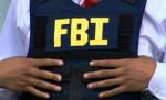 Dosarul a 14 români acuzaţi de fraudă şi furt de identitate, prezentat de FBI