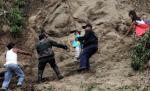 Update: Peste 25 de morţi şi 100 de dispăruţi, într-o alunecare de teren în Filipine