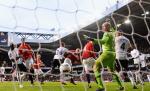 Rooney şi Young marchează împotriva lui Tottenham Hotspur şi menţin Manchester United la două puncte de City
