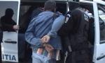 Încătuşat şi bătut până la ultima suflare. Doi "oameni ai legii", achetaţi pentru uciderea unui bărbat