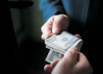 Împrumutul FMI, în viziunea internauţilor: Intrarea României în jocul afaceriştilor care vor să conducă lumea