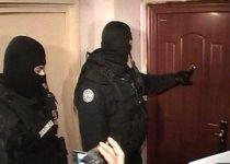 Timişoara. Descinderi în forţă, la locuinţele mai multor presupuşi falsificatori de documente 
