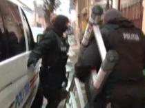 Descinderi la 36 de locuinţe pentru găsirea unor hackeri: 20 de suspecţi, reţinuţi