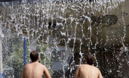 Românii mai au de înfruntat încă o zi de caniculă. Urmează ploi torenţiale şi furtuni (VIDEO)