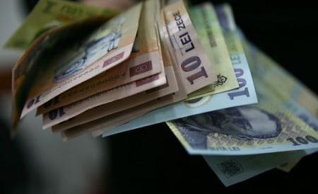 Reţea de falsificatori de bani, destructurată în Capitală