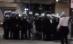 Imagini controversate de la summitul G20: Un grup de poliţişti se fotografiază cu un student arestat (VIDEO)