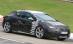 Opel Astra GTC 2011, surprins la teste pe circuitul Nordschleife de la Nürburgring (FOTO)