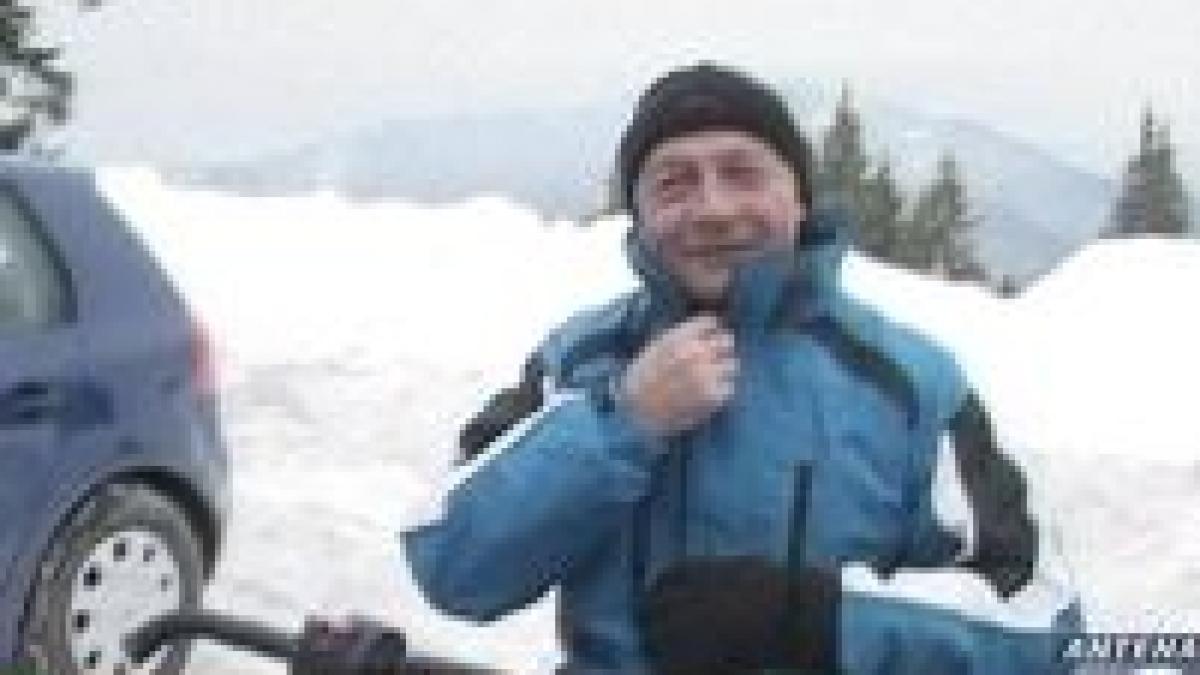 basescu uita de politica pe snowmobil