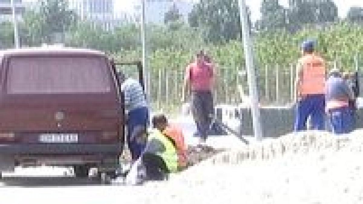 muncitorii romani motaie la soare a dat caldura