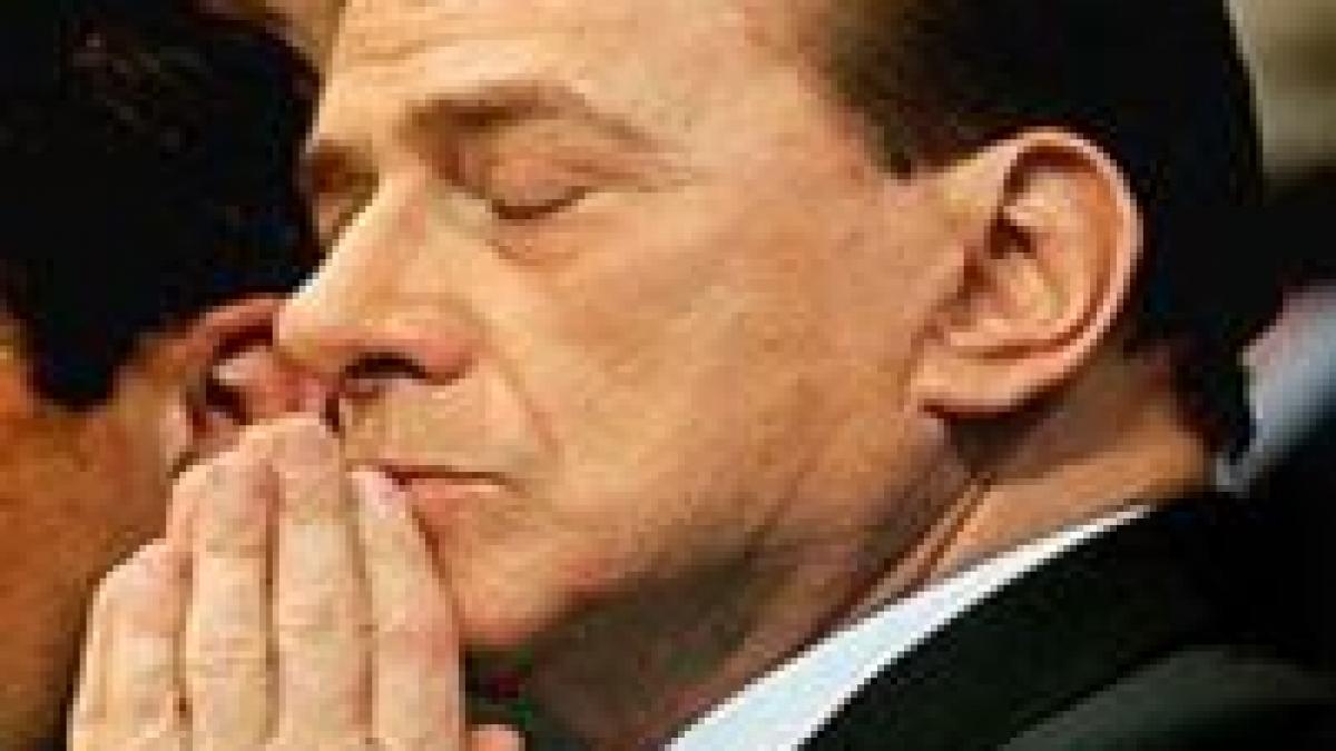 italia berlusconi a lesinat din nou
