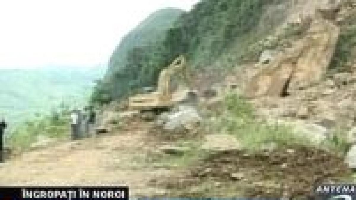 60 de morti intr un autobuz ingropat de pamant si pietre