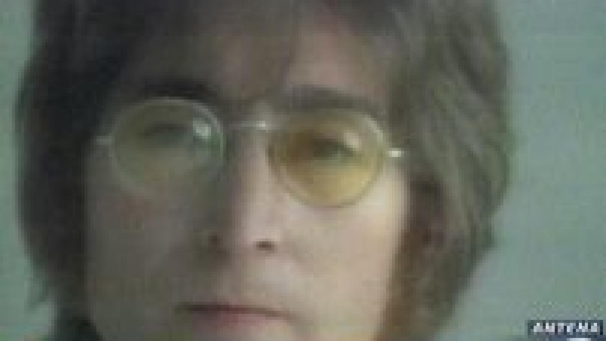 rama unor ochelari purtati de john lennon la licitatie