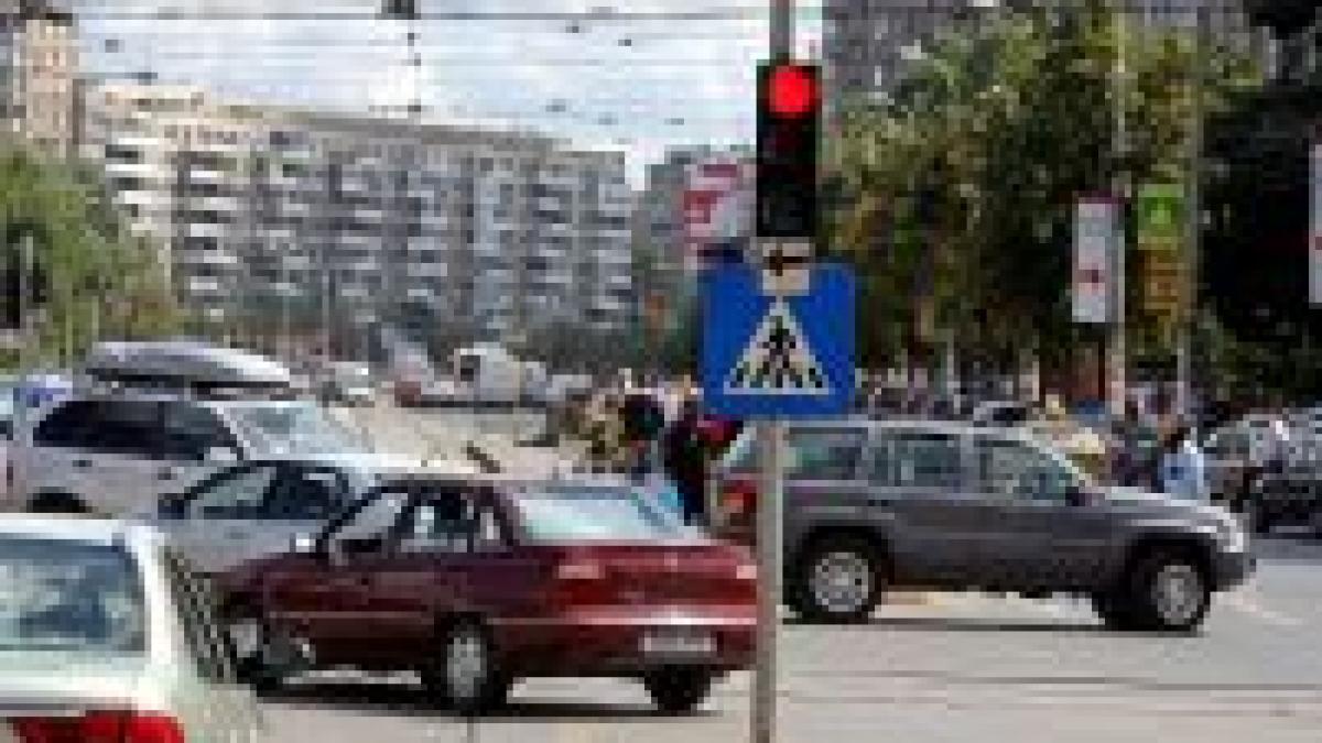 Computerele vor stabili cât stăm la semafor
