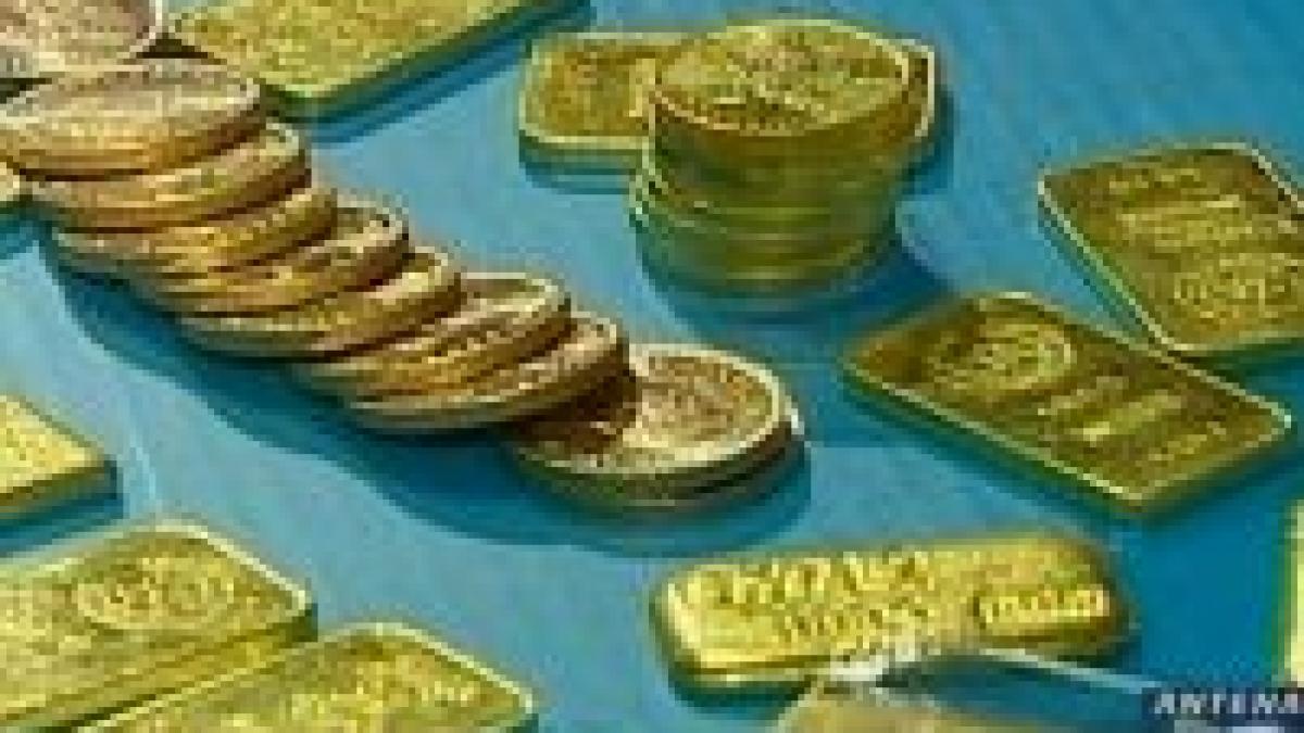 record istoric peste 900 de dolari uncia de aur