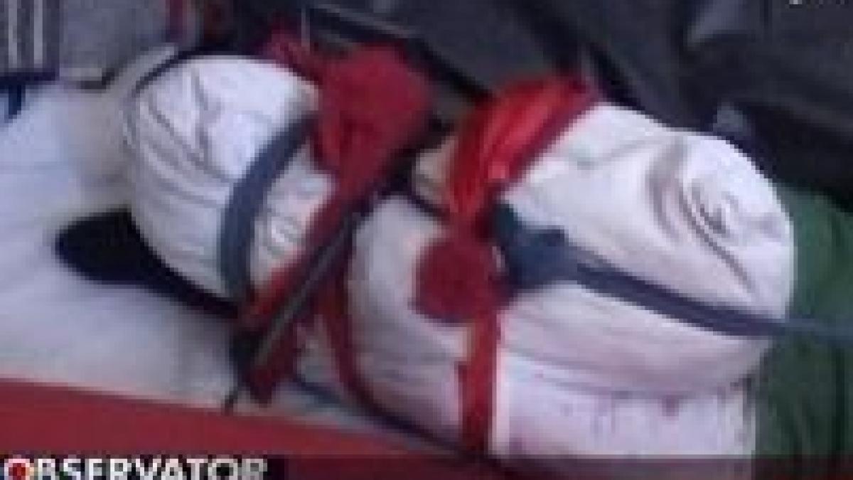 arad copil tinut in camasa de forta la un centru de reabilitare