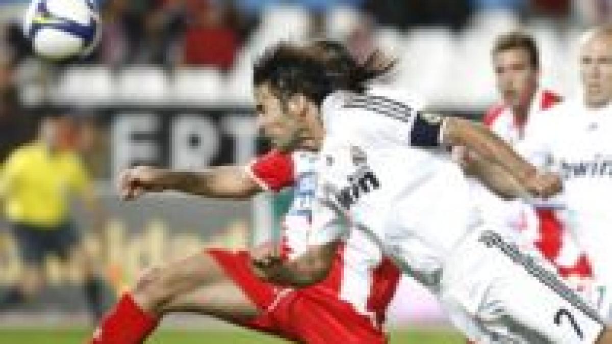 madrid rateaza sansa urcarii pe prima pozitie almeria real 1 1