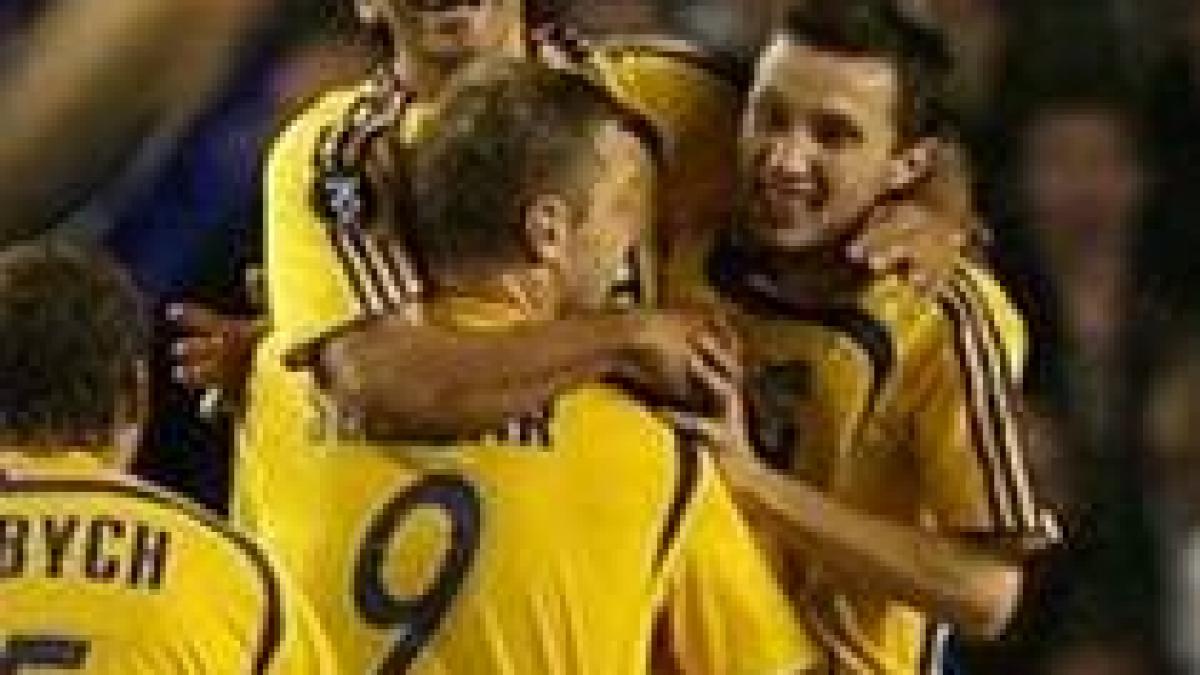 grupa b metalist termina in frunte olympiakos elimina hertha