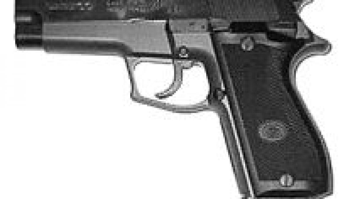 agent de politie impuscat din greseala de un coleg