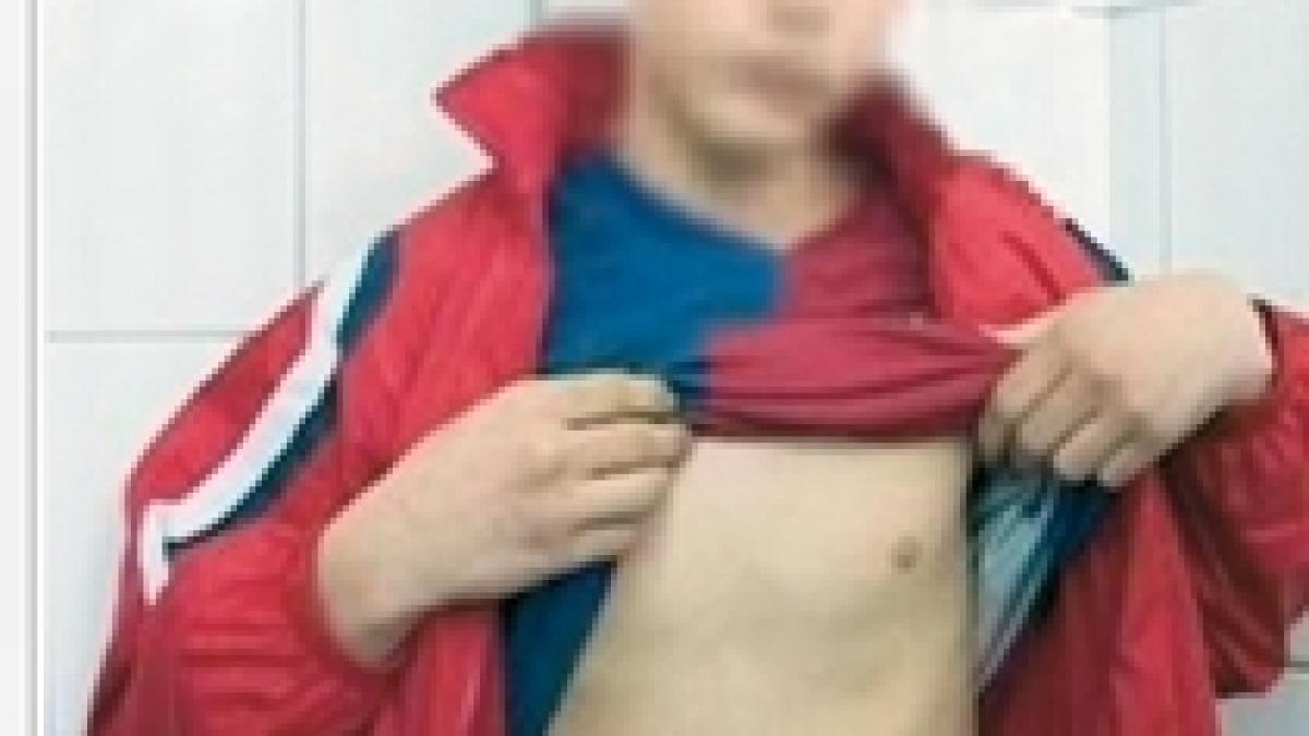 timis elev de 13 ani lovit cu pumnul de profesorul de chimie