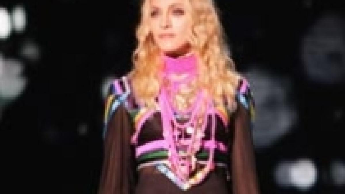 madonna a donat jumatate de milion de dolari sinistratilor din italia