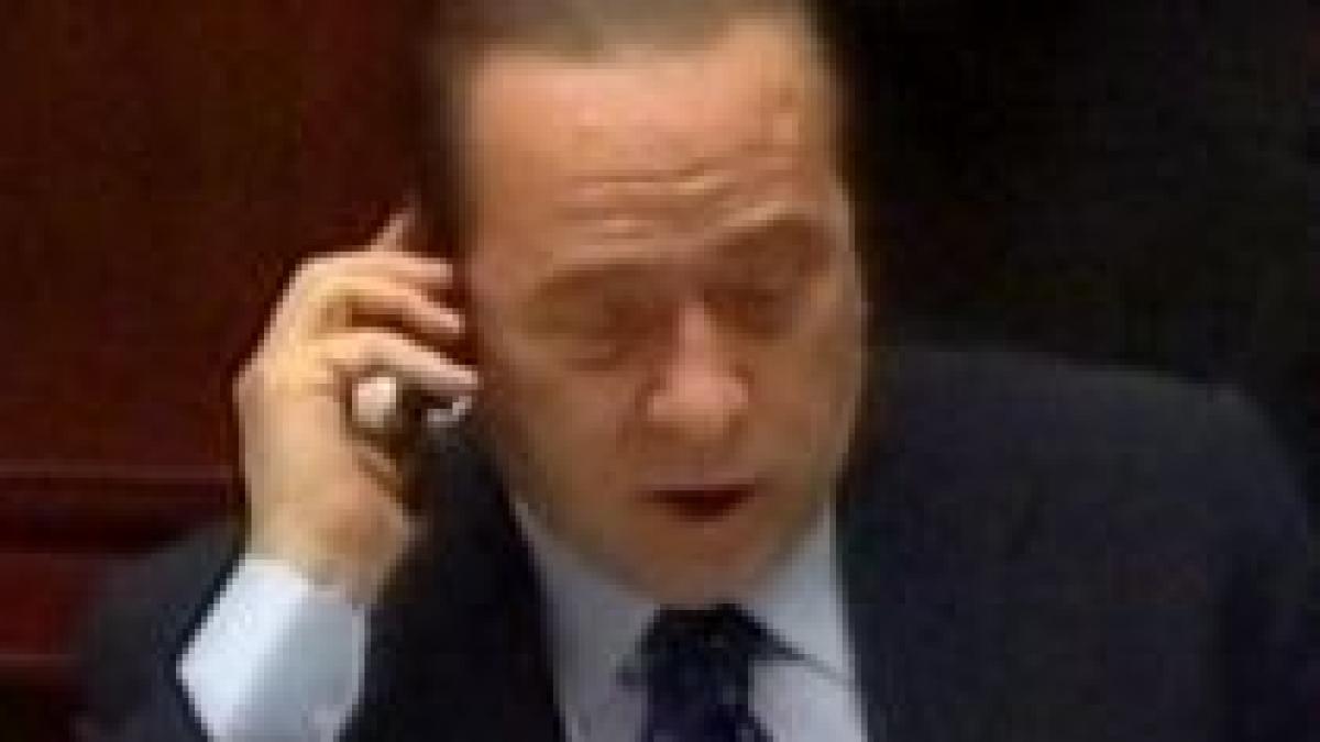 berlusconi inregistrat in timp ce planuieste o intalnire cu o dama de companie video
