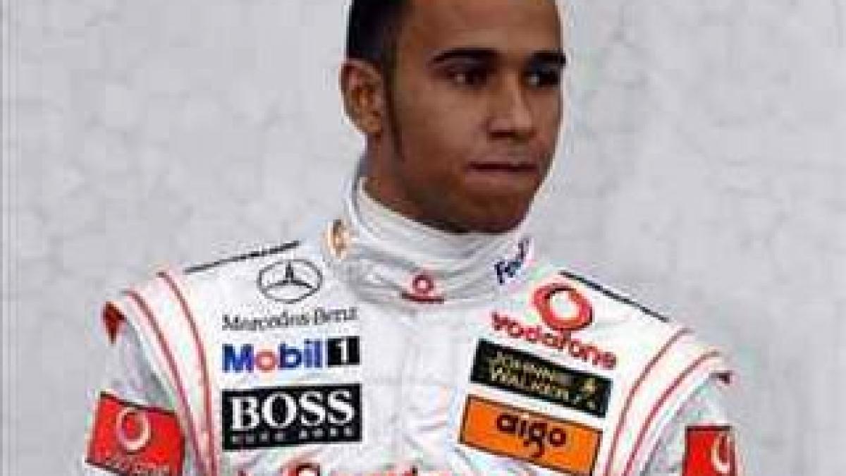 lewis hamilton incantat de revenirea lui schumacher va fi un privilegiu sa concurez cu el