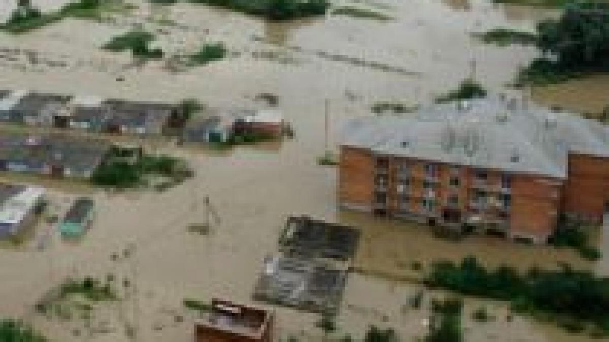 rusia un mort si doua persoane disparute dupa ruperea unui dig