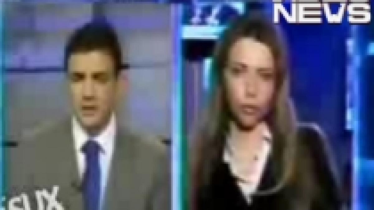 angajata unui post de televiziune lesina in direct video