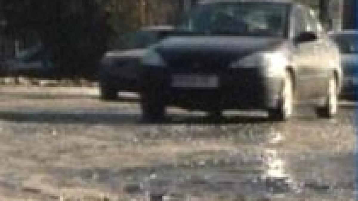 zapada trece gropile raman capitala invadata de cratere in asfalt