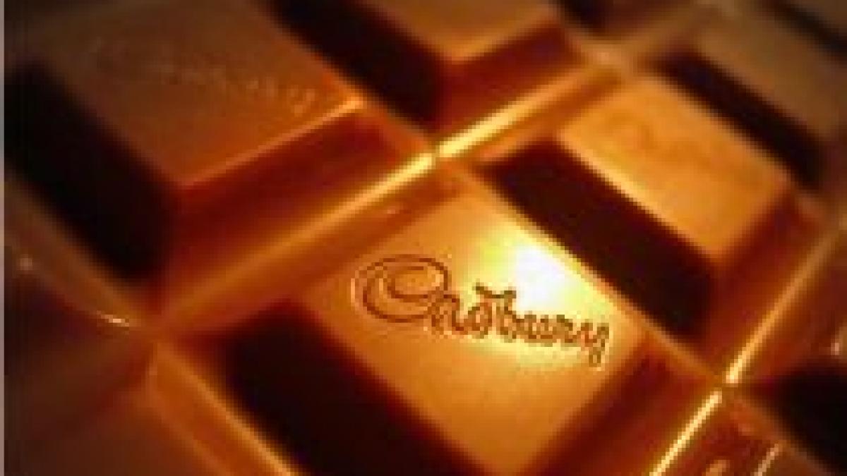 kraft renunta la operatiunile cadbury din romania si polonia si cumpara compania britanica